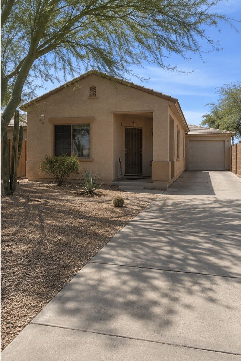A clean desert-style home exterior after a junk removal job